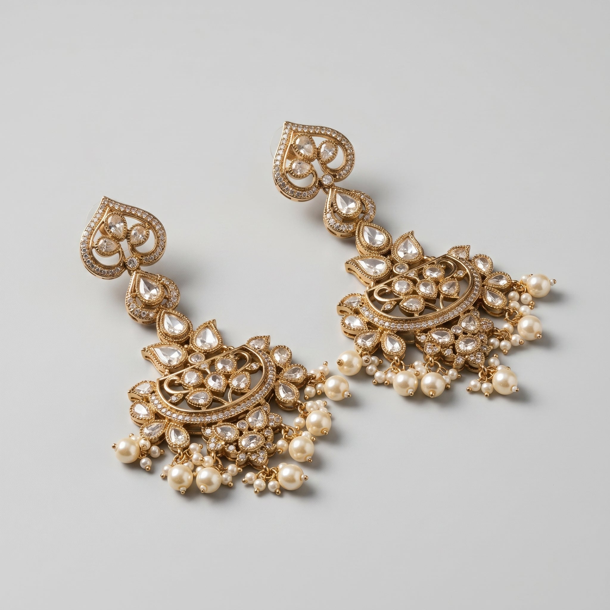 Moti Chandbali Earrings detail showing crescent polki work and pearl dangles