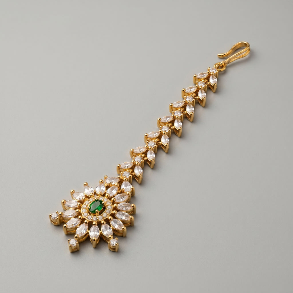 Emerald Star Tikka detail showing marquise link chain and emerald center sunburst