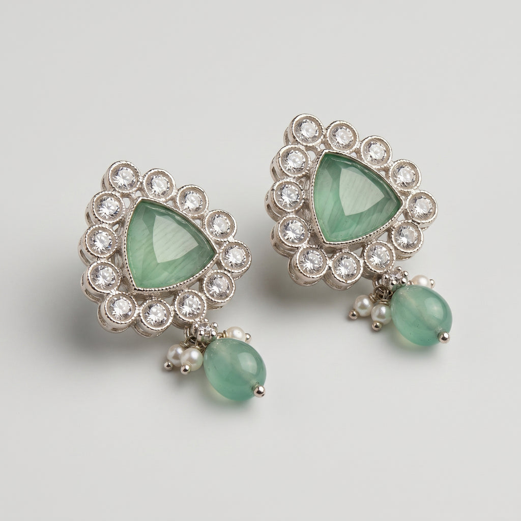 Rani Aqua Earrings detail showing crystal halo triangular cabochon and green bead pearl drop