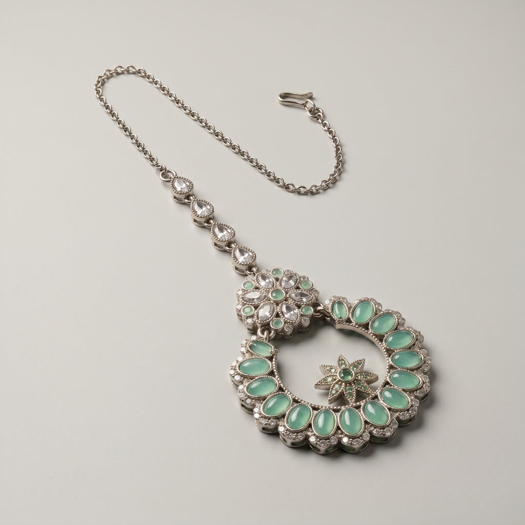 Aqua Star Tikka detail showing aqua oval stone ring and center star motif inside open circle