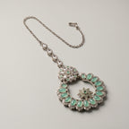 Aqua Star Tikka detail showing aqua oval stone ring and center star motif inside open circle