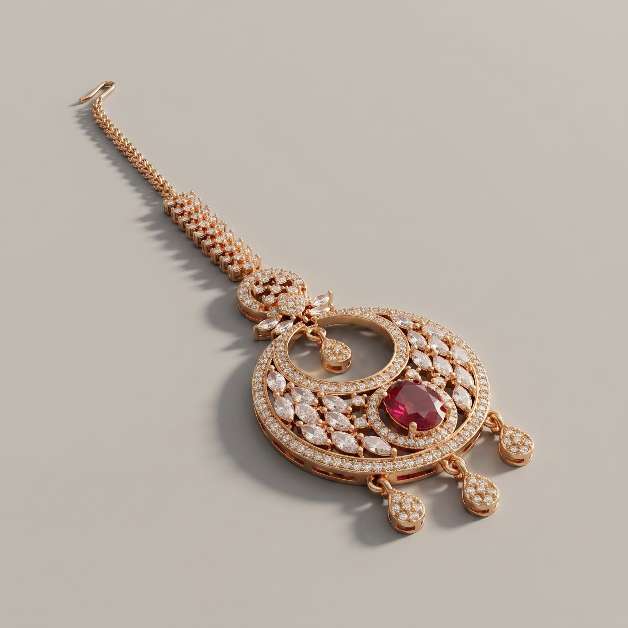Ruby Tikka detail showing marquise crystal frame, red center stone, and three teardrop dangles