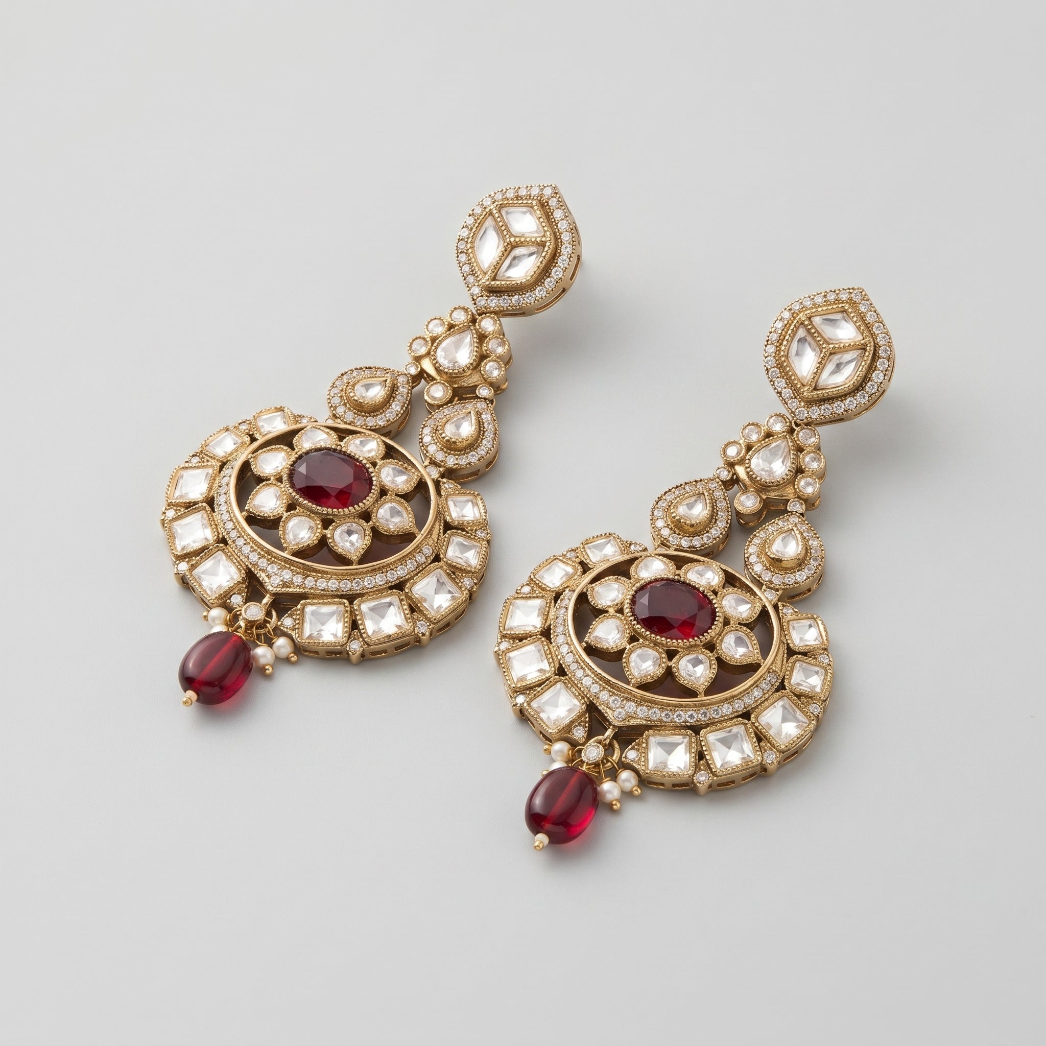 Kundan Ruby Earrings detail showing ruby oval and pearl accents