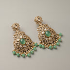 Zara Mint Earrings detail showing milky mint-green center stone, pavé filigree frame, and green bead pearl dangles
