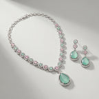 Aqua Rose Necklace Set detail of alternating pastel halo stones and pear aqua pendant