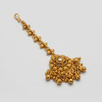 Rani Tikka detail showing granulated floral pendant and gold bead drops