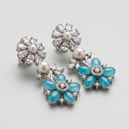 Moti Firoza Earrings detail showing pearl stud marquise leaf branches and blue petal flower drop