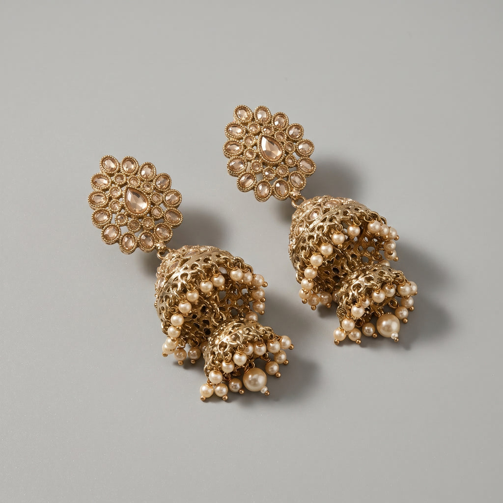 Rani Moti Earrings antique gold-tone double jhumka earrings with pearl fringe on gray background
