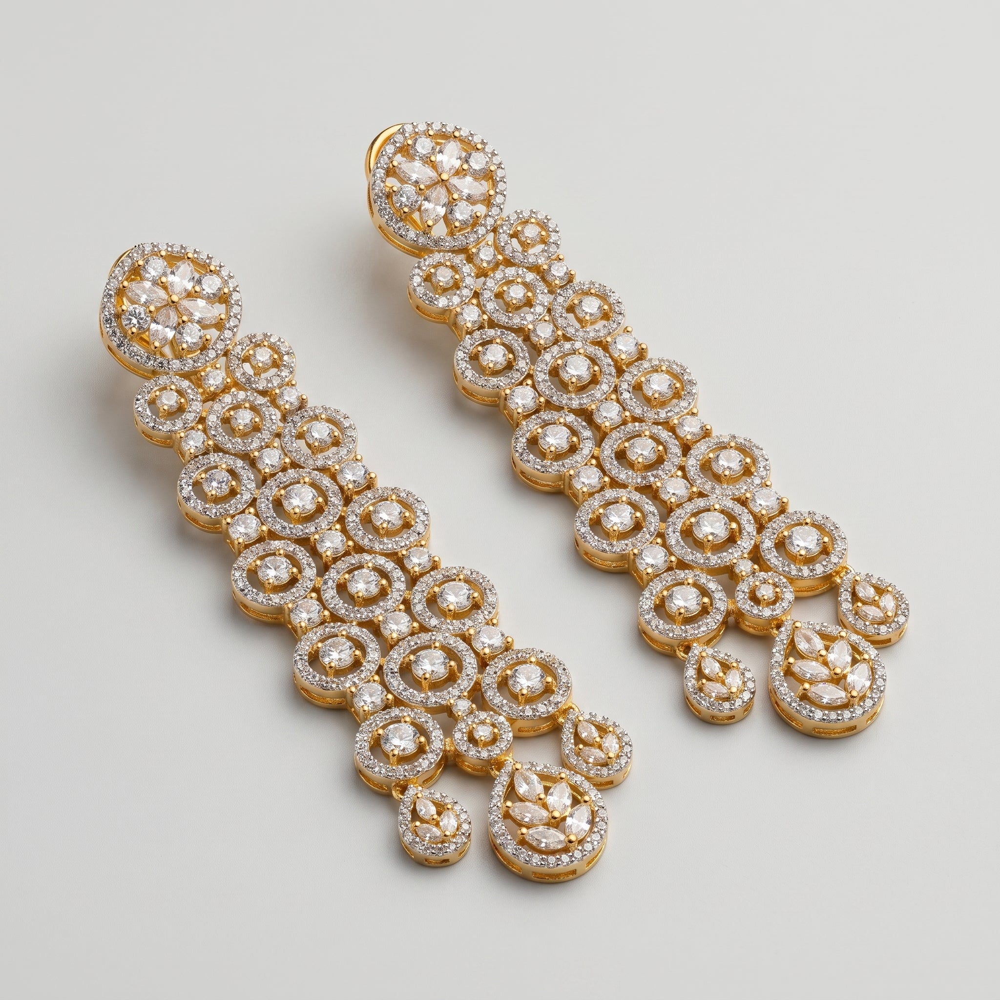Rani Cascade Earrings detail showing stacked circle tiers and triple teardrop dangles