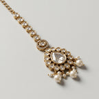 Noor Pearl Tikka detail showing crystal stem and pearl fringe clusters