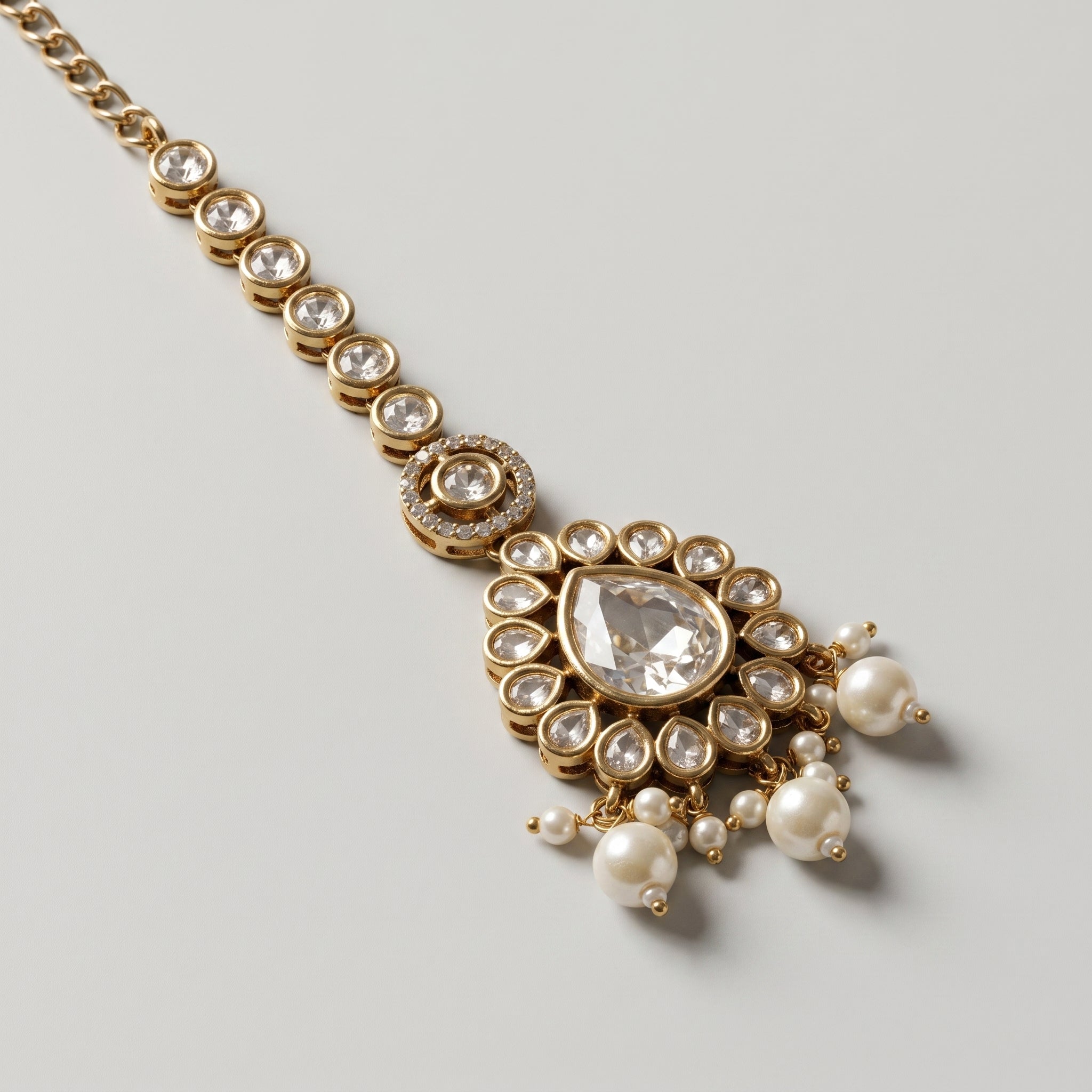 Noor Pearl Tikka detail showing crystal stem and pearl fringe clusters