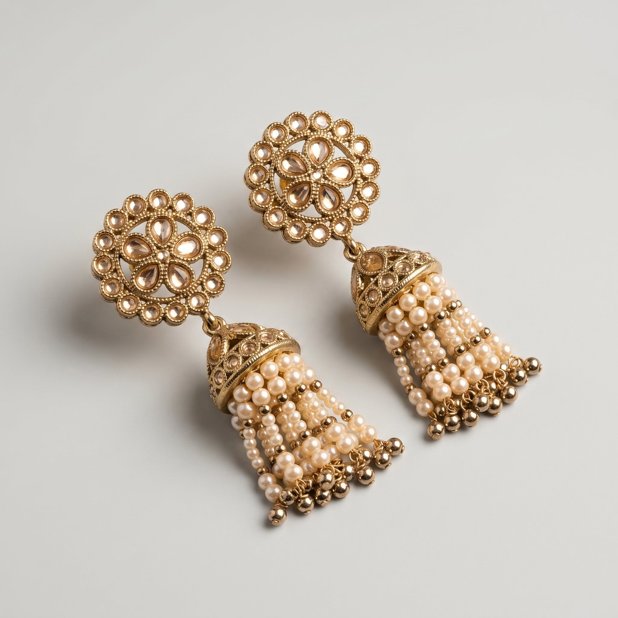 Gajra Pearl Earrings detail showing champagne floral stud bell cap and five pearl strand dangles
