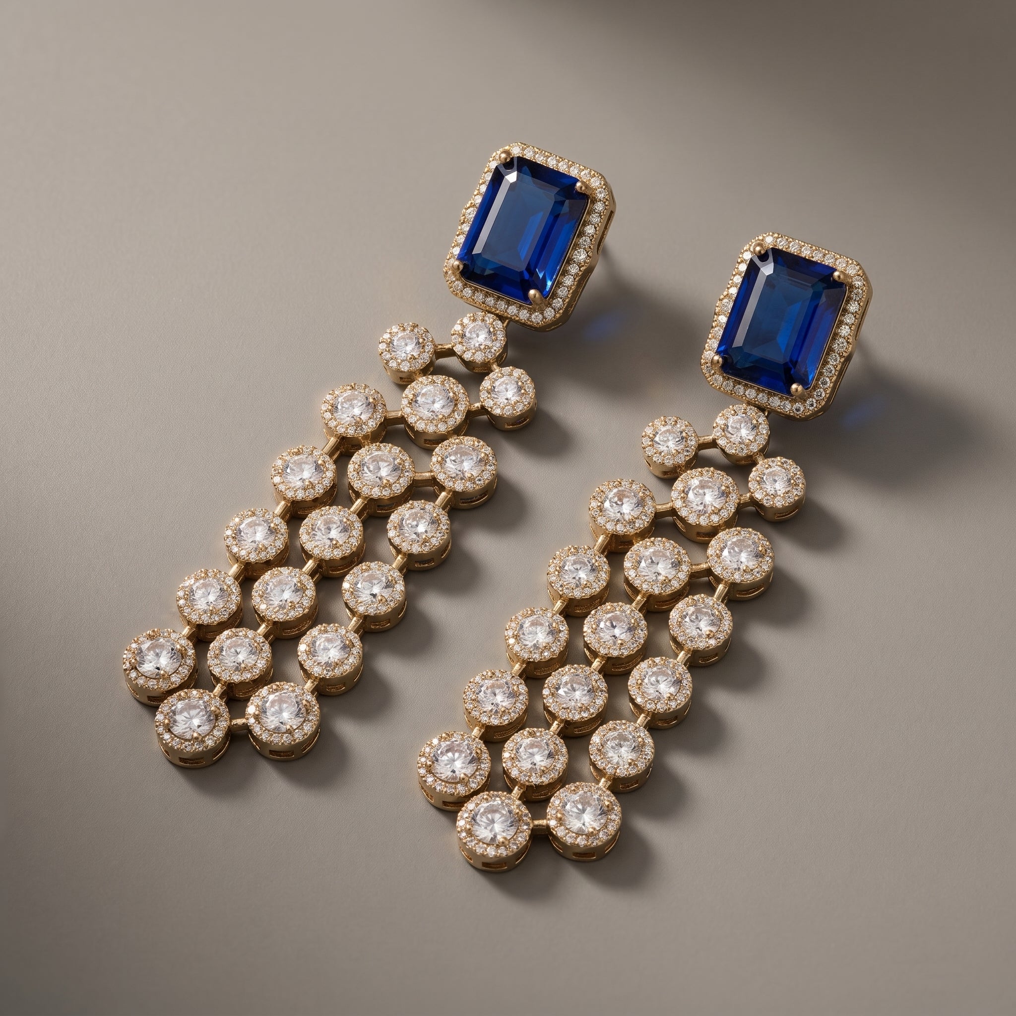 Neelam Drop Earrings detail showing triple cascading crystal columns