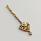 Golden Flora Tikka detail showing tiered pavé heart and bottom pear drop