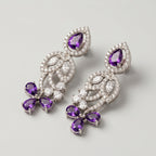 Pari Amethyst Earrings detail showing swirling filigree, marquise crystal leaves, and triple amethyst cluster