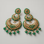 Jadau Panna Earrings detail showing tiered jali crescent, emerald teardrops, and pearl dangles