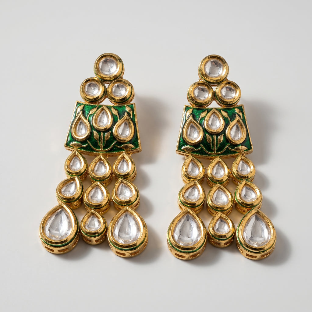 Kiara Emerald Earrings detail showing emerald enamel plaque and cascading teardrop stone tiers
