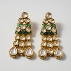 Kiara Emerald Earrings detail showing emerald enamel plaque and cascading teardrop stone tiers