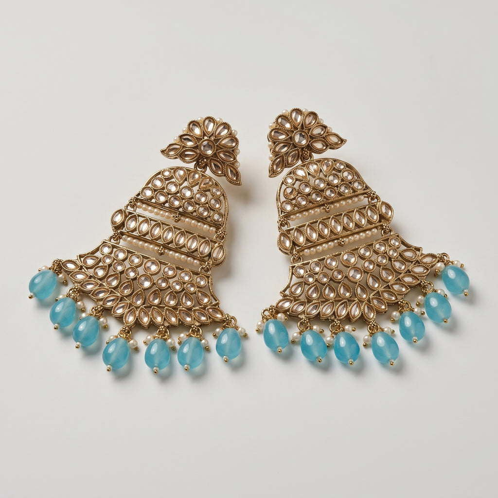 Pearl Aqua Earrings detail showing polki floral tiers, pearl lines, and light blue oval dangles