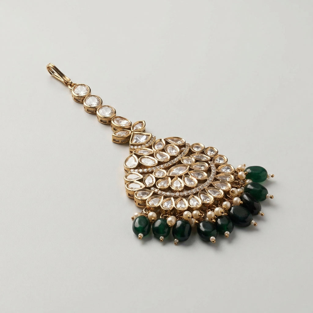 Priya Emerald Tikka detail showing crystal fan pendant, green beads, and pearl accents