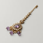 Sia Amethyst Tikka detail showing purple centerpiece and clear crystal stem