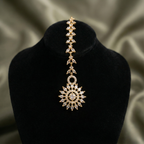 Solar Line Tikka close-up of marquise chevron links and radiating sunburst clear stones