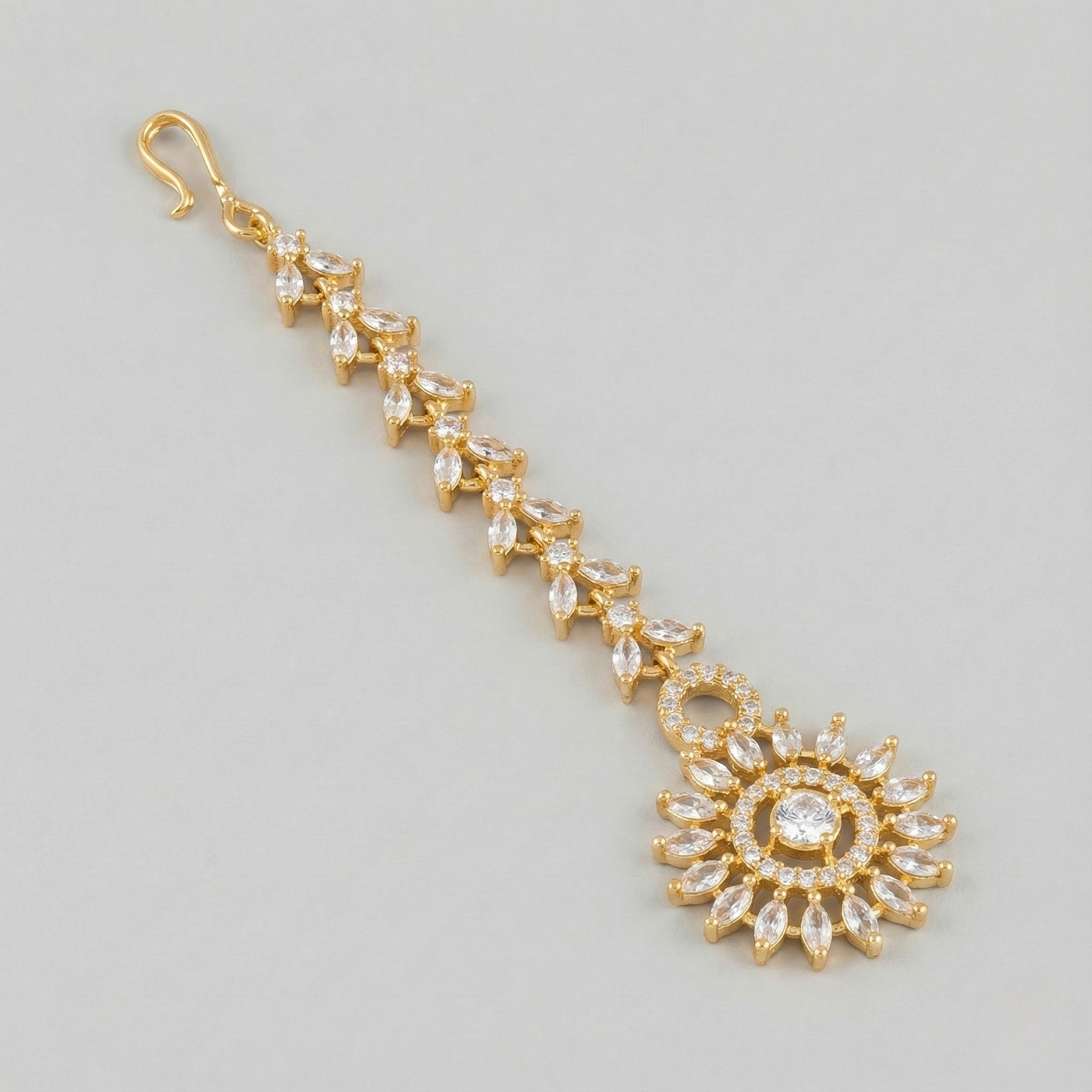 Solar Line Tikka close-up of marquise chevron links and radiating sunburst clear stones