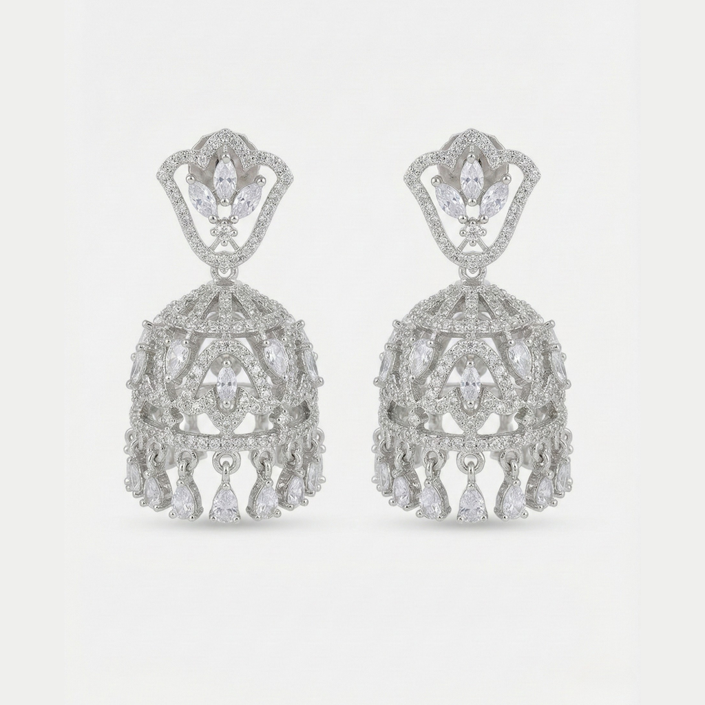 Aurelia Crystal Jhumkas rhodium-tone crystal jhumkas with marquise and teardrop dangles on gray background