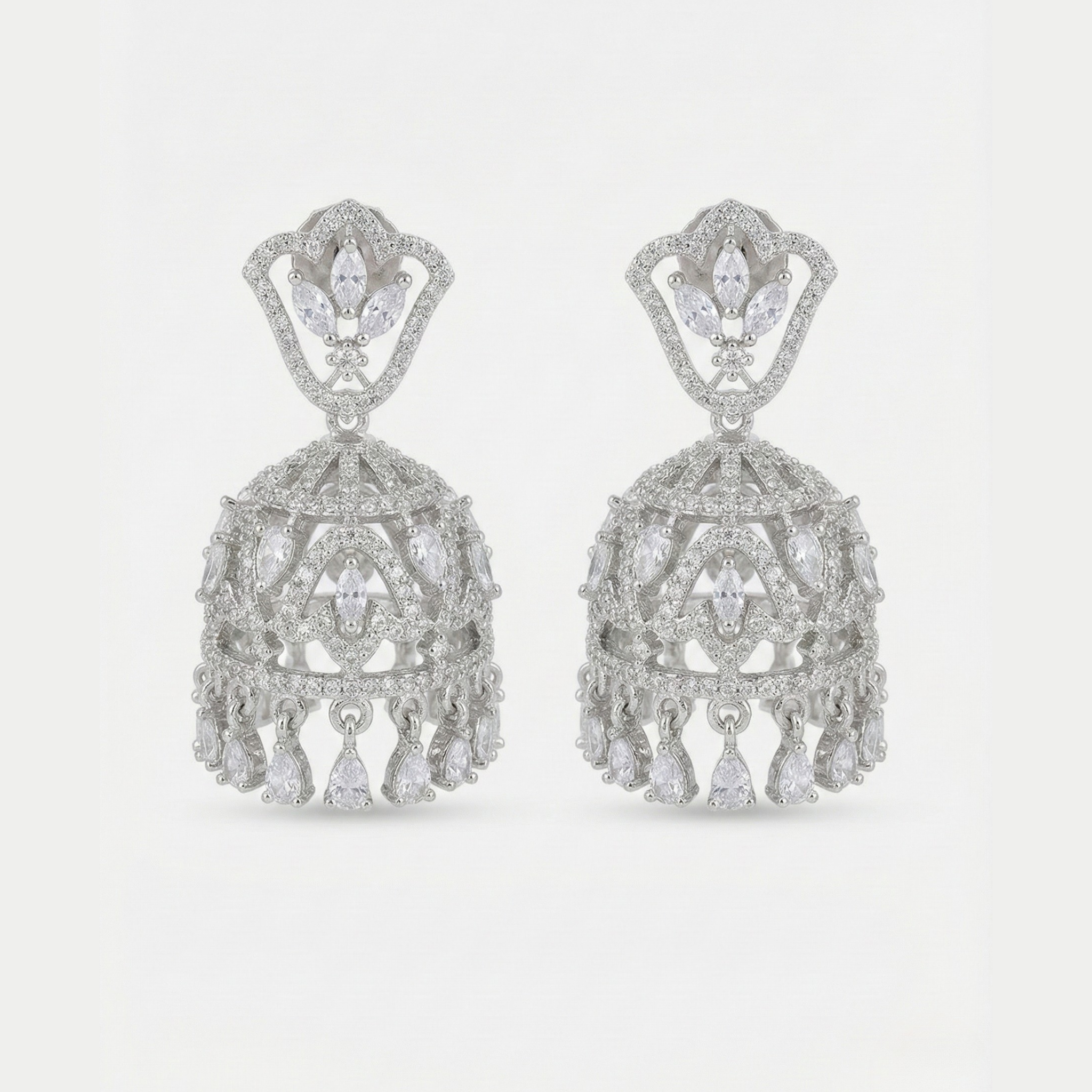 Aurelia Crystal Jhumkas rhodium-tone crystal jhumkas with marquise and teardrop dangles on gray background
