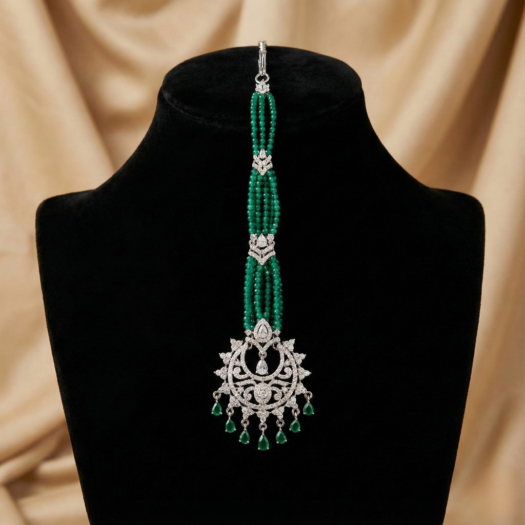 Verdant Noor Tikka detail showing green bead rows and pavé sunburst medallion