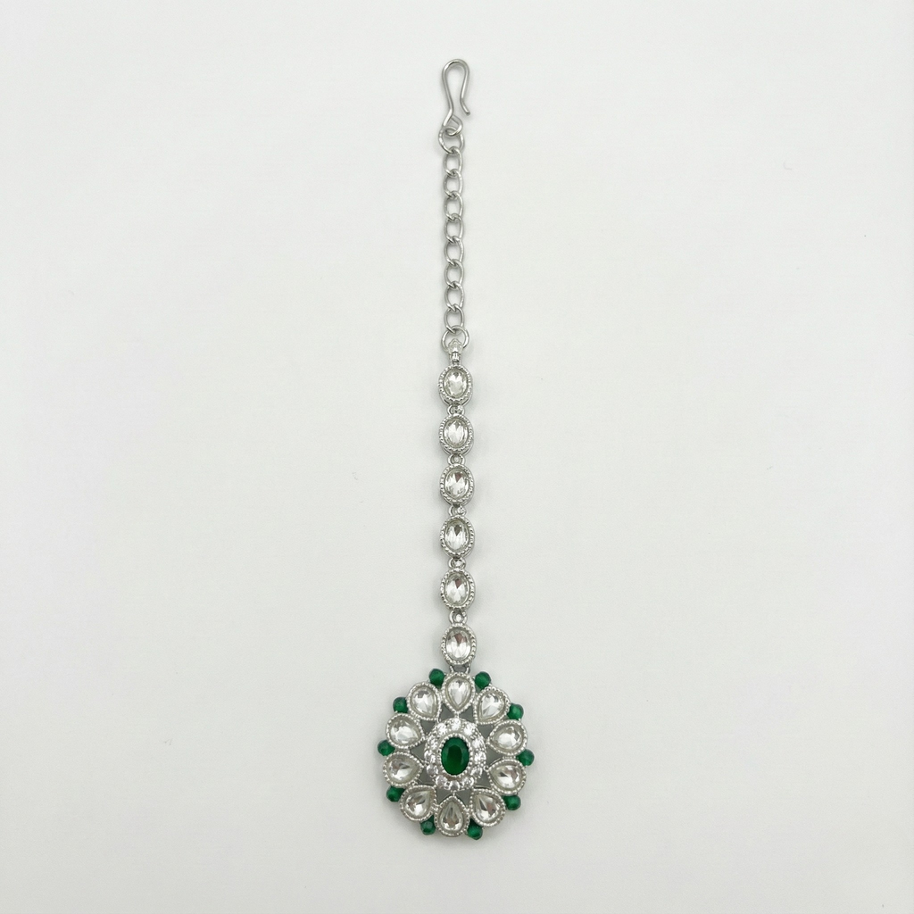 Emerald Axis Tikka silver floral maang tikka with emerald center and clear petal halo