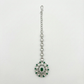 Emerald Axis Tikka silver floral maang tikka with emerald center and clear petal halo