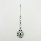 Emerald Axis Tikka silver floral maang tikka with emerald center and clear petal halo