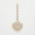 Crescent Lace Tikka gold-tone fan-shaped maang tikka with floral clear-stone center on gray background