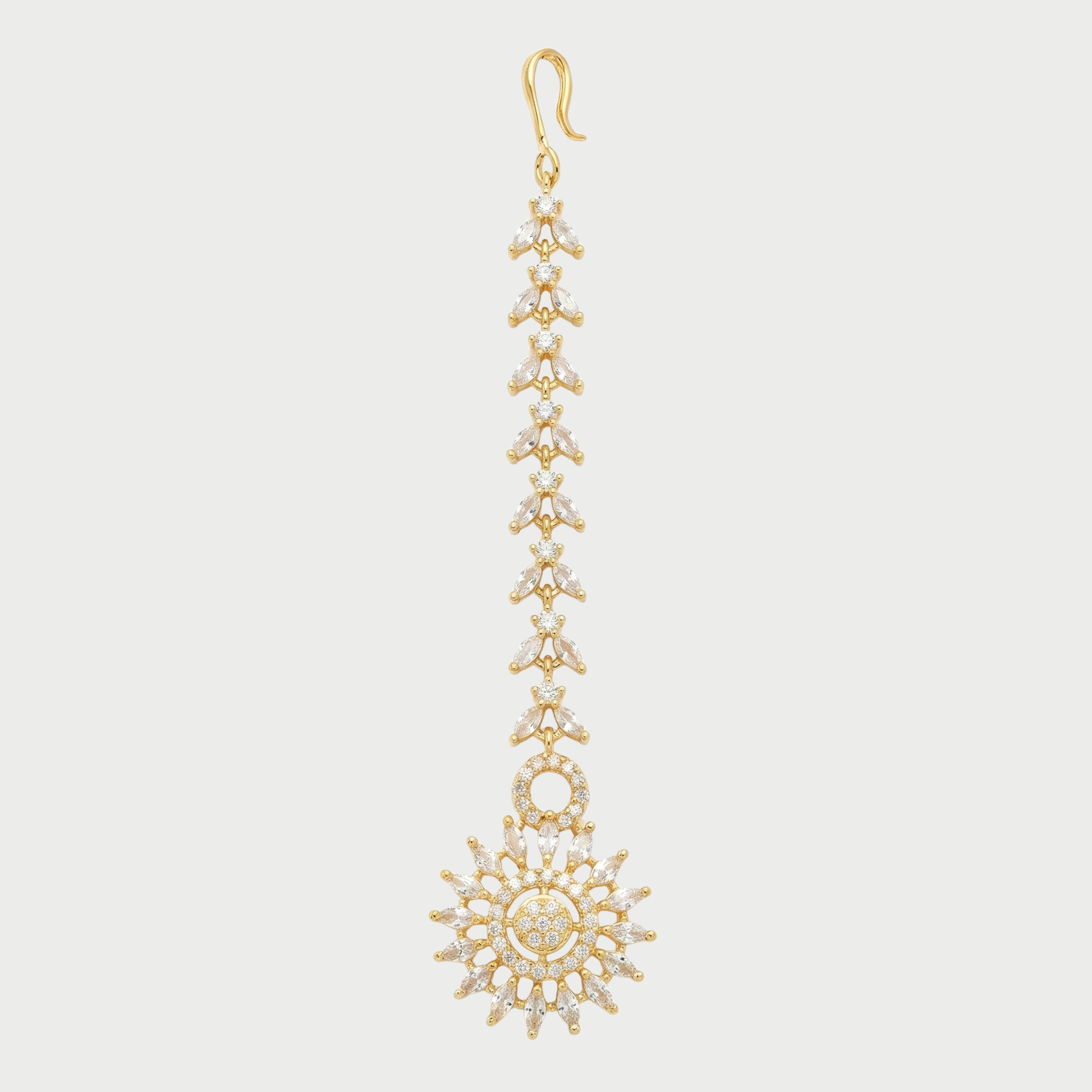 Solar Line Tikka gold-tone maang tikka with sunburst round pendant and chevron chain on gray background